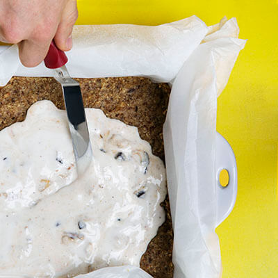 Step 3 Ganache being spread over crust